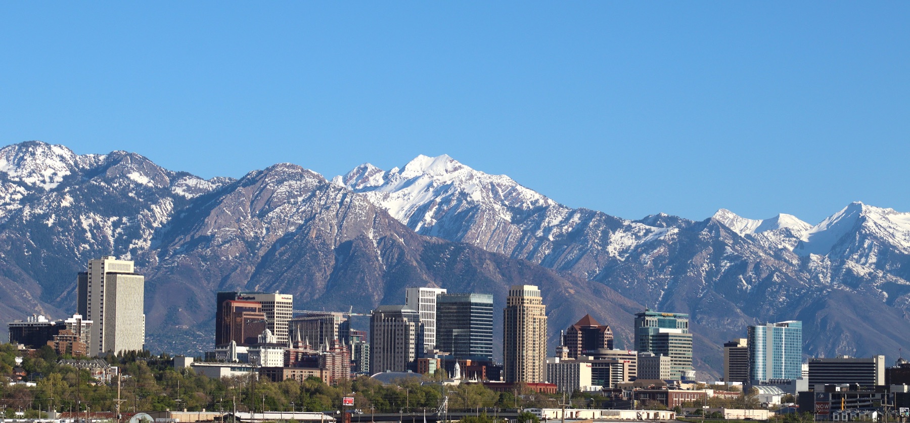 Salt Lake City skyline beneath the snow-covered Wasatch Mountains